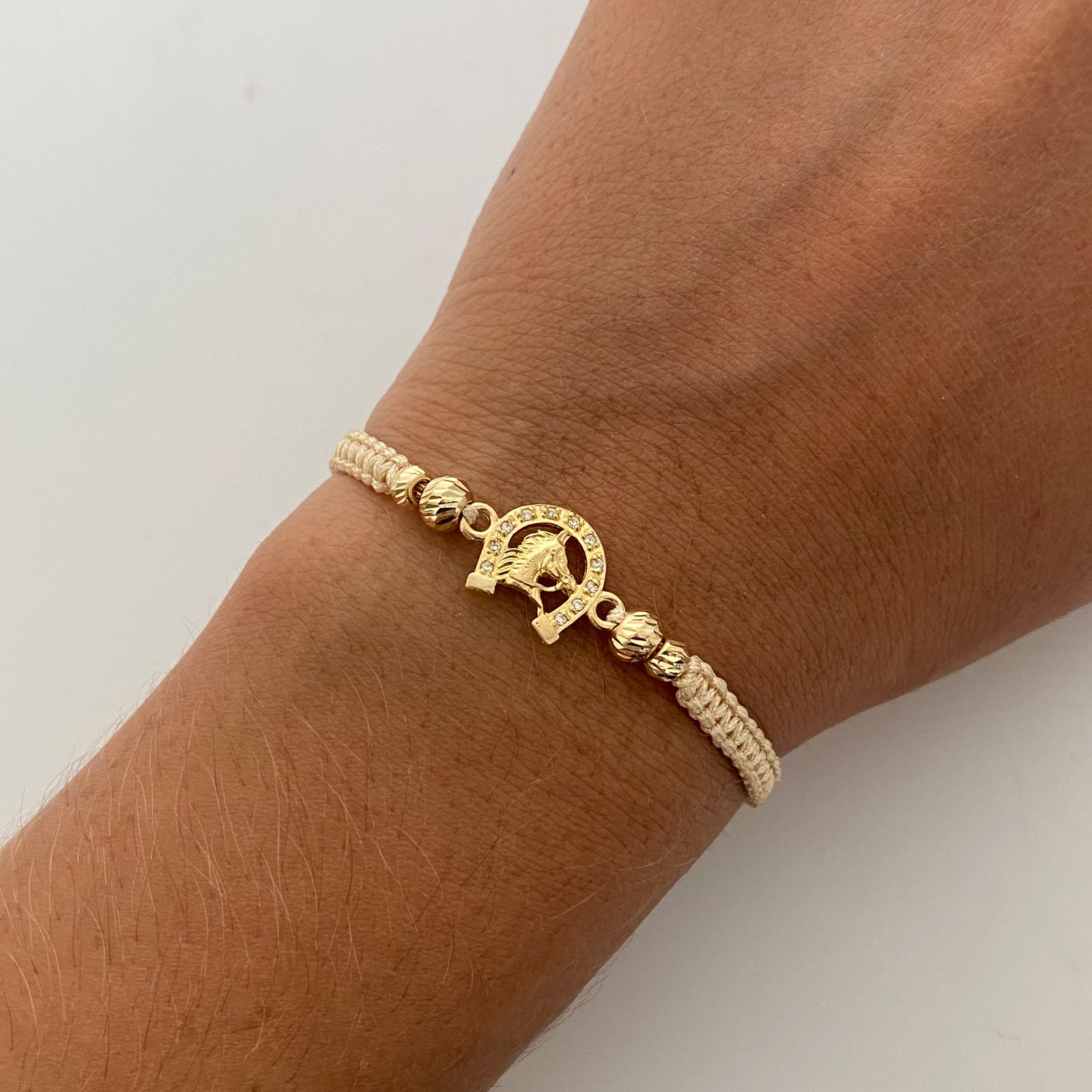 Pulsera tejida Herradura casting bolas diamantadas 5y4mm Oro amarillo 18k 1,45 Gr