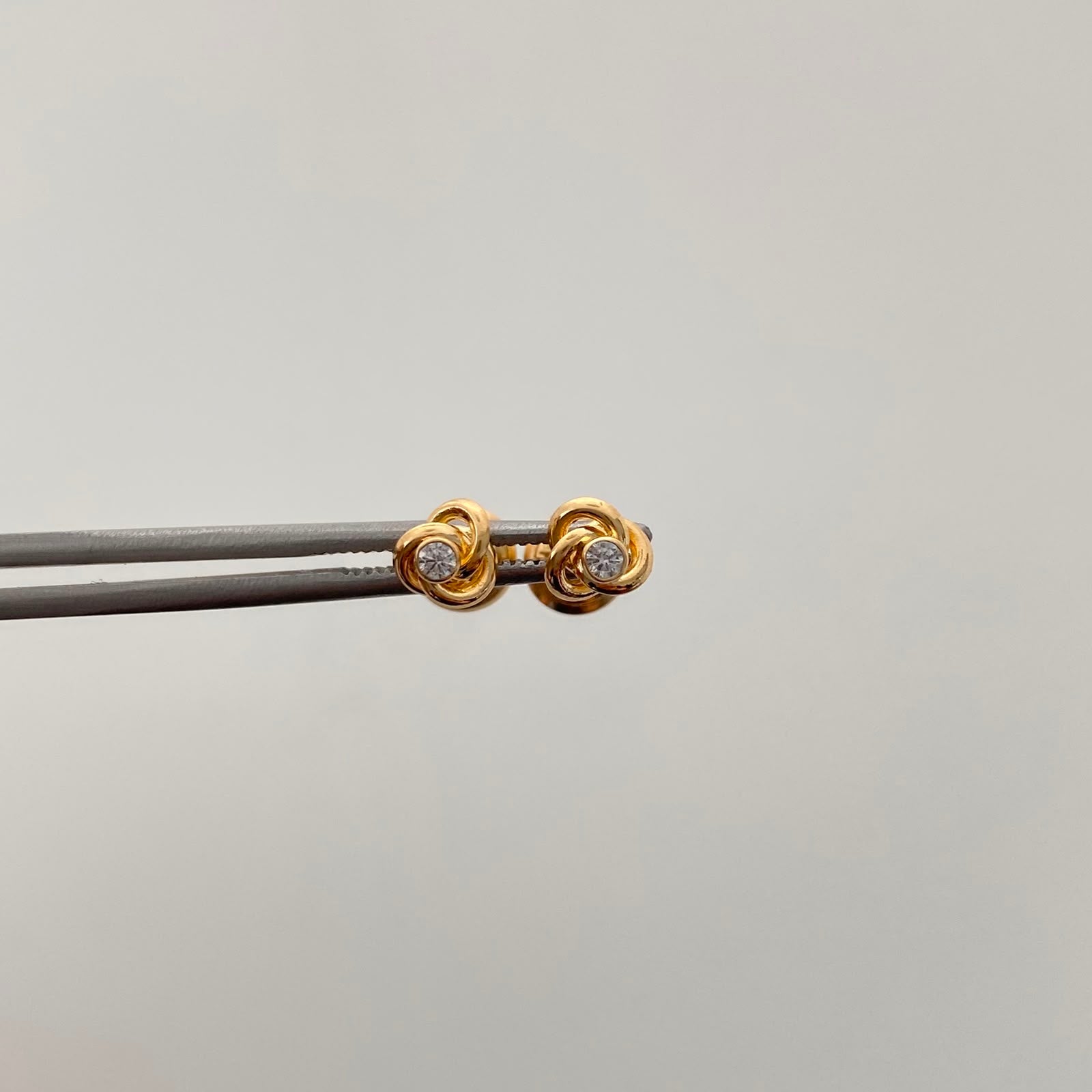 Topos Nudo Circon Oro amarillo 18k 0,9 Gr / 5,2 mm