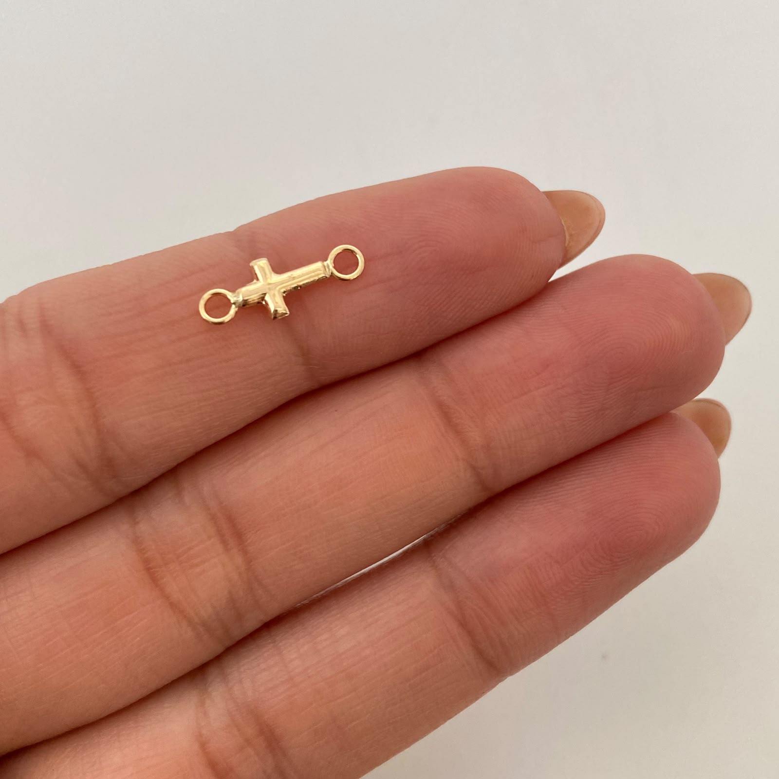 Herraje Mini Cruz Oro amarillo 18k 0,2 Gr / 1,5 Cm