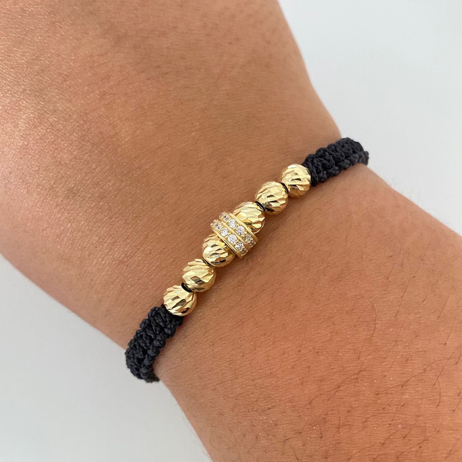 Pulsera tejida herraje rueda casting balines diamantados #6 Oro amarillo 18k 2,55 Gr