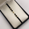 Pulsera tejida Herraje cruz lisa bolas diamantadas 4mm hilo negro Oro amarillo 18k 0,45 Gr