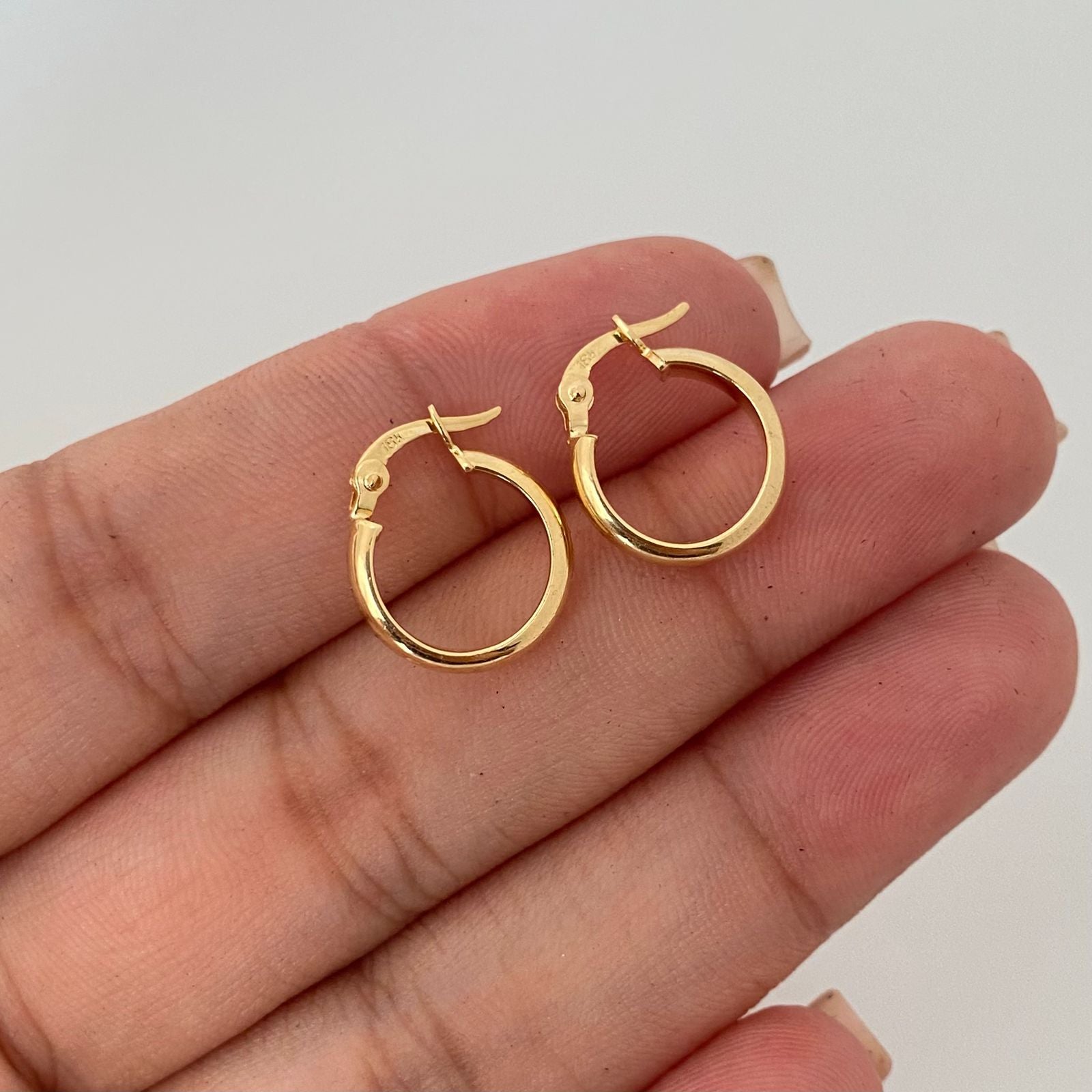 Candonga redonda lisa Oro amarillo 18k 1,20 Gr / 1,5 Cm