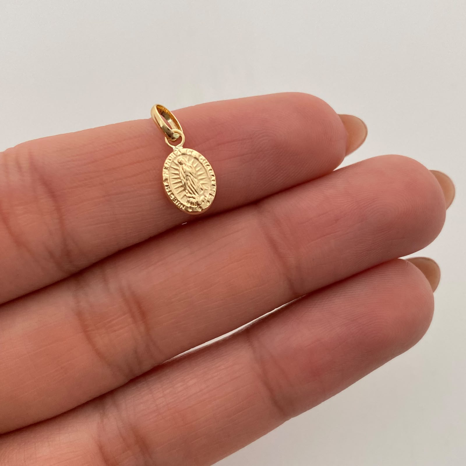 Dije Virgen de Guadalupe Oro amarillo 18k 0,35 Gr / 6,9 mm / 1,5 Cm