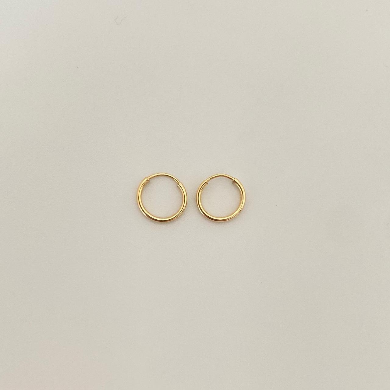 Candonga imperdible lisa Oro amarillo 18k 0,4 Gr / 0,8 Cm