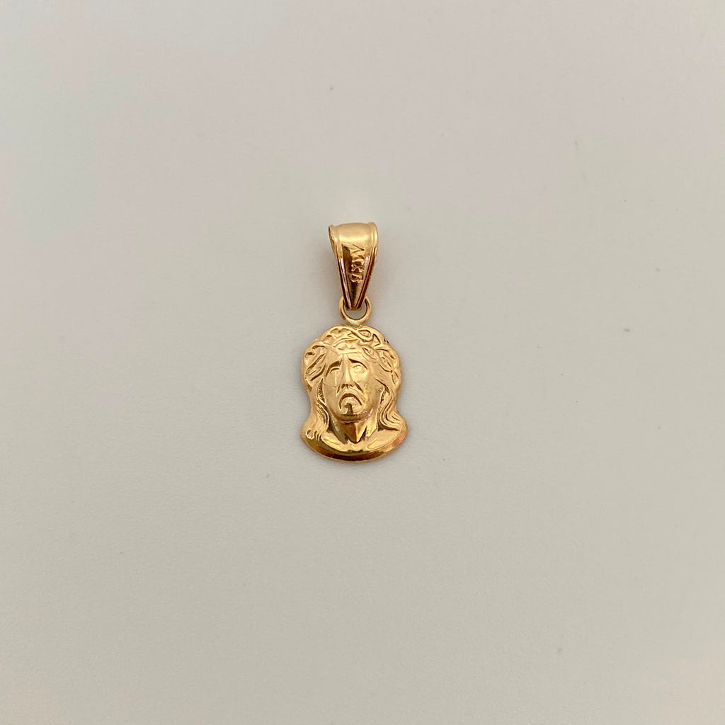 Dije Rostro Oro amarillo 18k 0,65 Gr / 9,5 mm / 2 Cm
