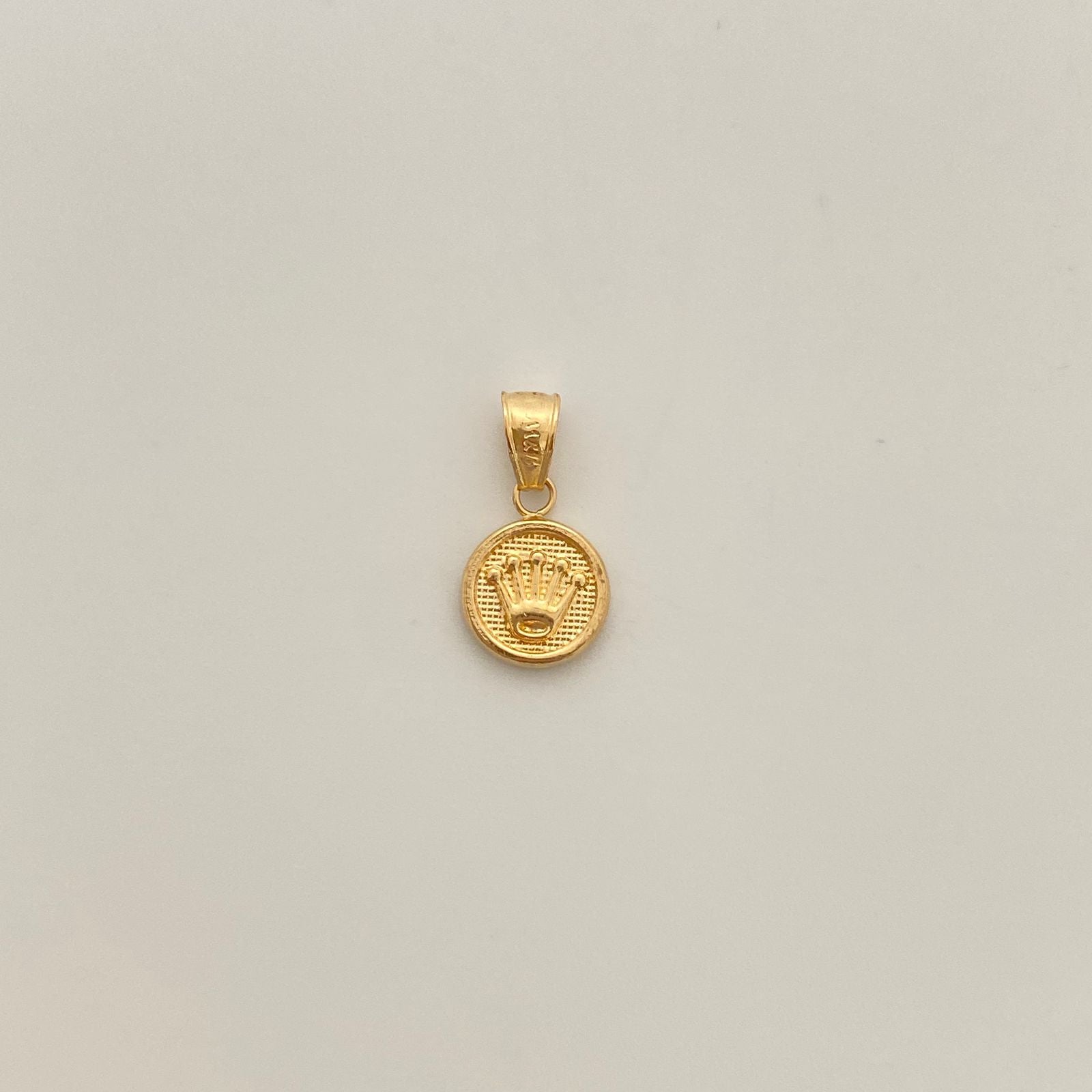 Dije corona rx con diamantado  Oro amarillo 18k 0,65 Gr / 10,14 mm / 1,7 Cm