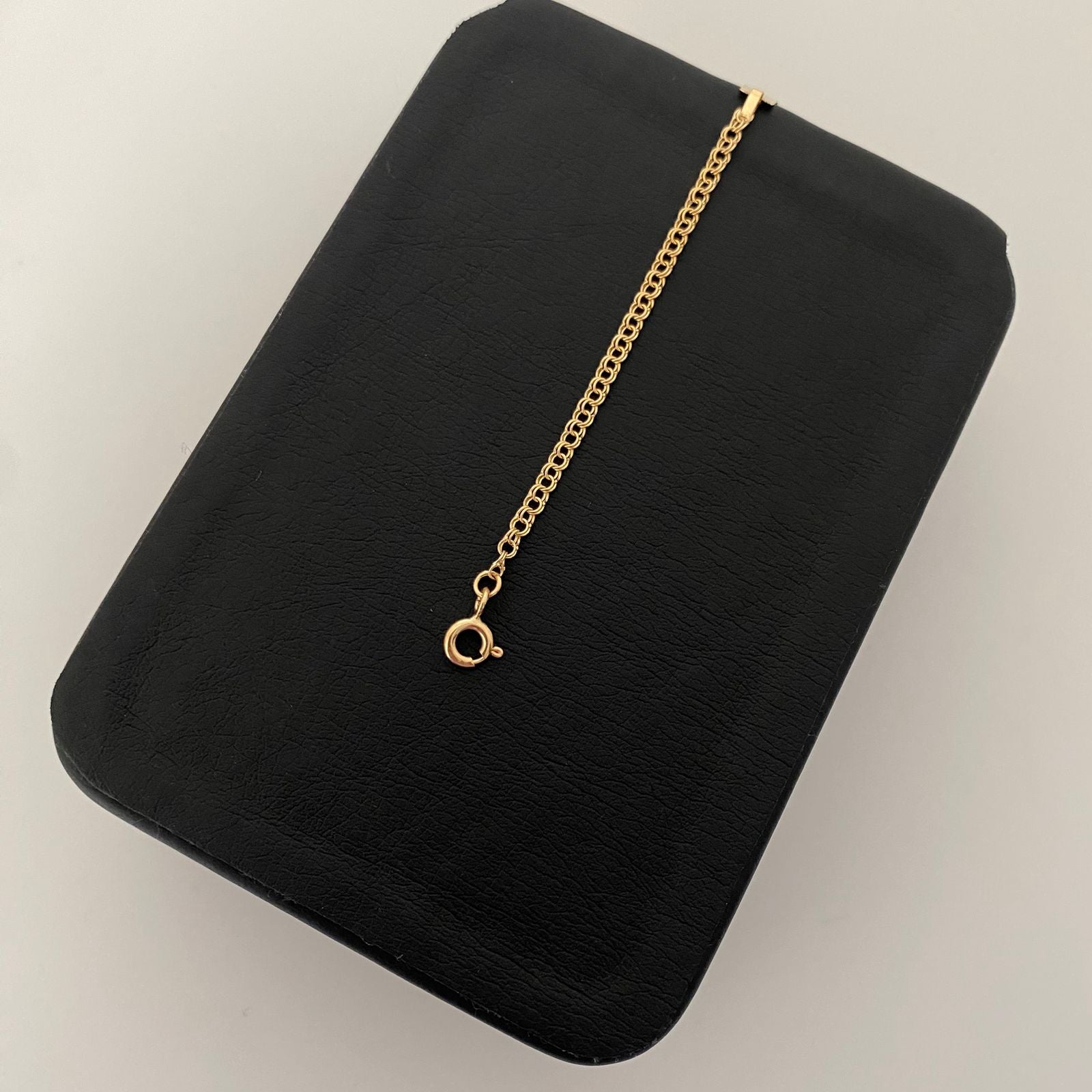 Pulso bebé placa lisa semi rectangular Oro amarillo 18k 1,35 Gr / 5,5 mm / 15 Cm Broche 0,15