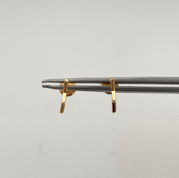 Topos estrella Oro amarillo 18k 1 Gr / 1,2 mm
