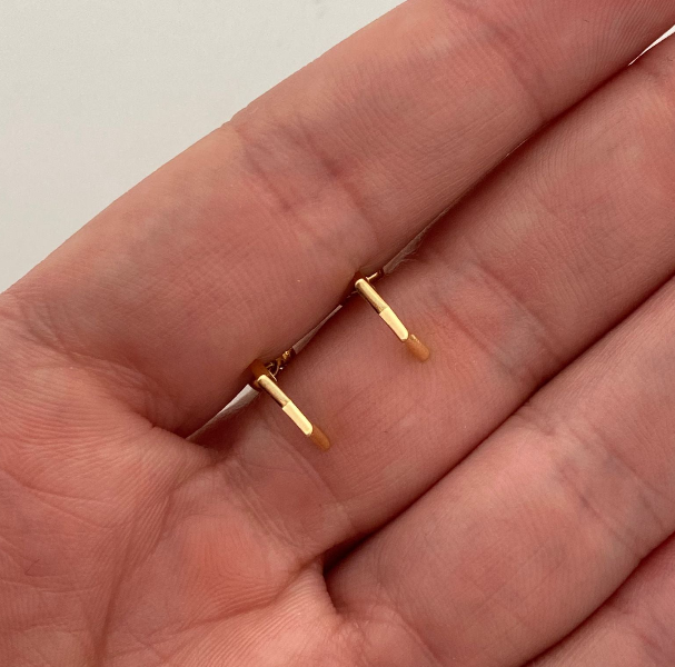 Topos estrella Oro amarillo 18k 1 Gr / 1,2 mm