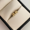 Topos bici con circones blancos Oro amarillo 18k 0,65 Gr / 5,8 mm
