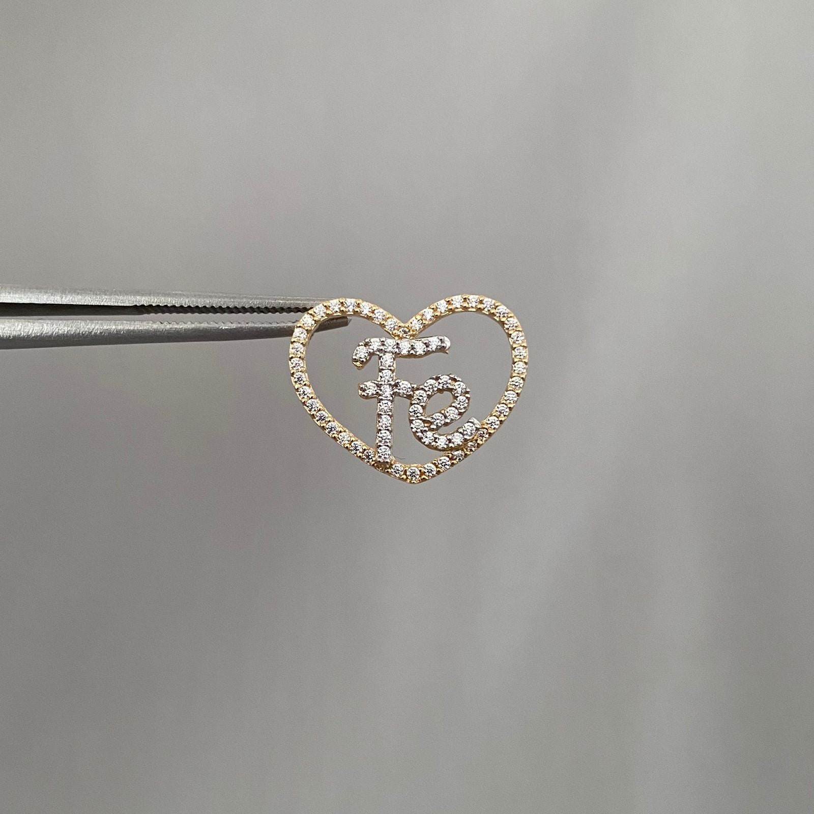 Dije corazon fe Oro amarillo y Oro blanco 18k 1,65 Gr / 1,5 Cm