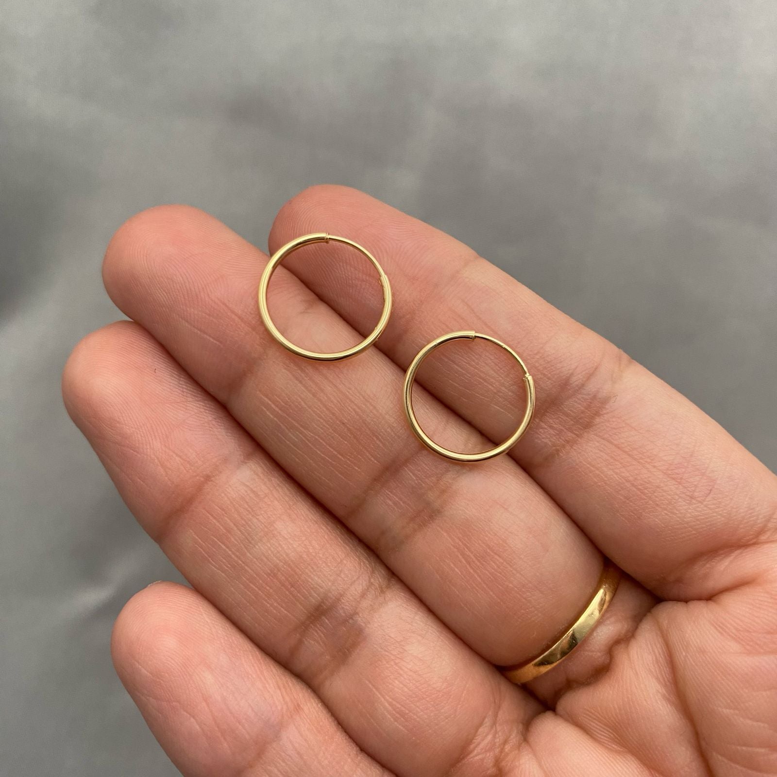 Candonga imperdible lisa Oro amarillo 18k 0,75 Gr / 1,5 Cm