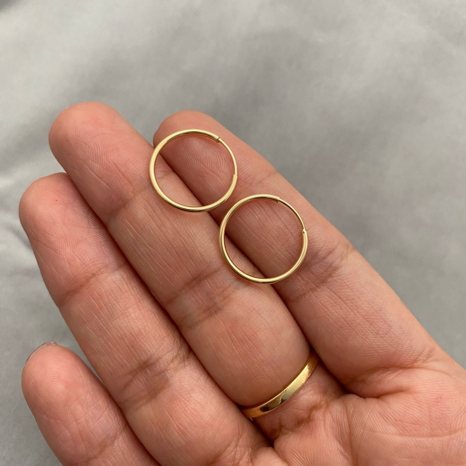 Candonga imperdible lisa Oro amarillo 18k 0,8 Gr / 1,5 Cm