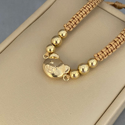 Pulsera tejida herraje oso 2 bolas lisas #6 y 4 #5 Oro amarillo 18k 2,15 Gr