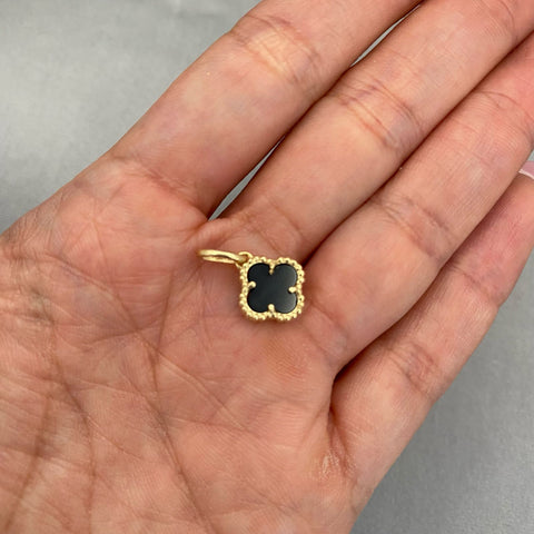Dije trebol fondo negro Oro amarillo 18k 1,35 Gr / 1,8 Cm
