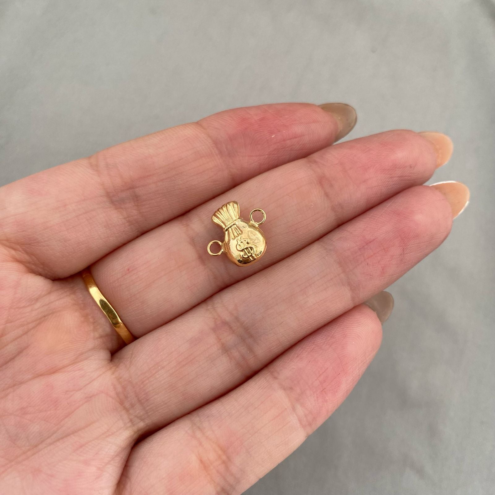 Herraje bolsa dinero Oro amarillo 18k 0,55 Gr / 1,3 Cm