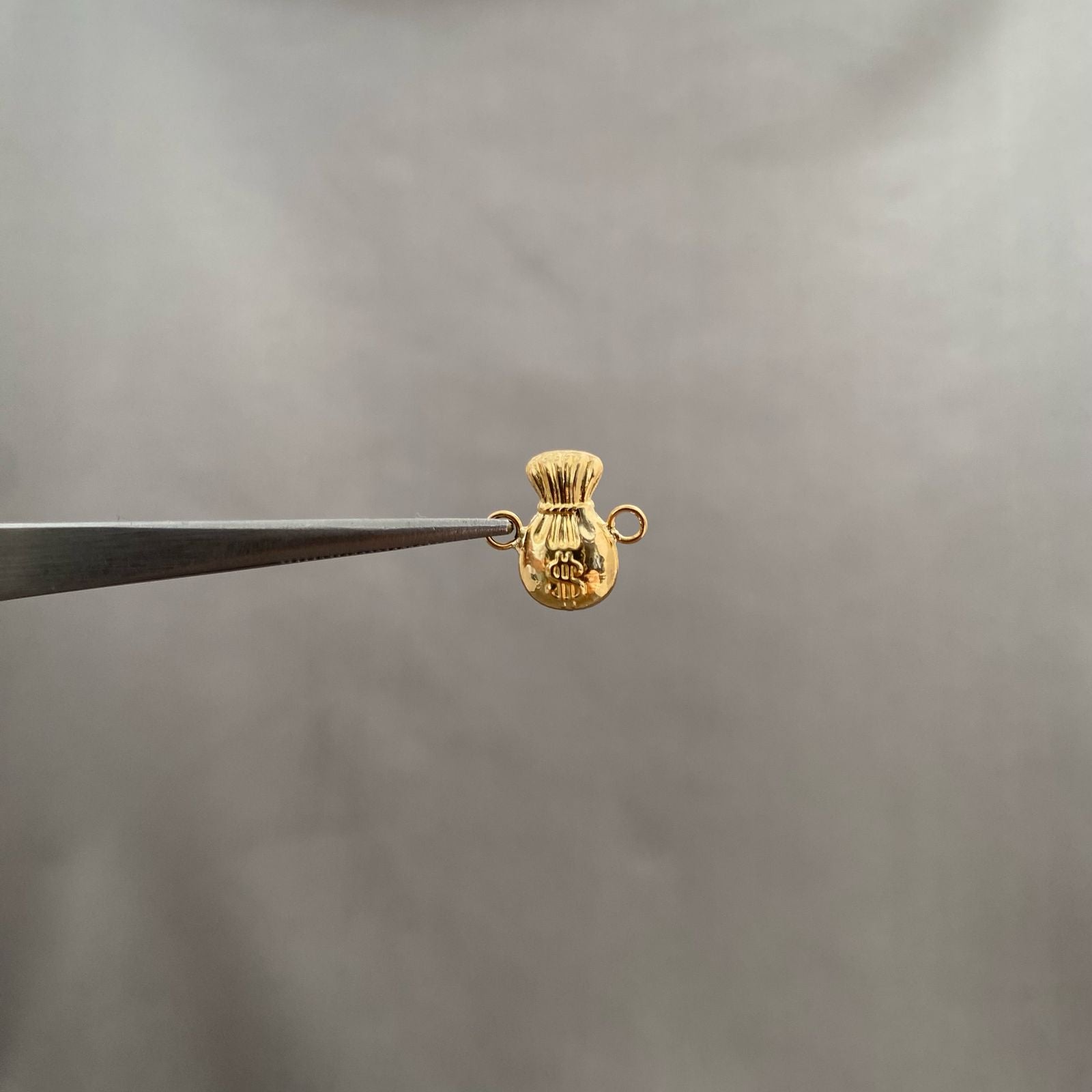 Herraje bolsa dinero Oro amarillo 18k 0,55 Gr / 1,3 Cm