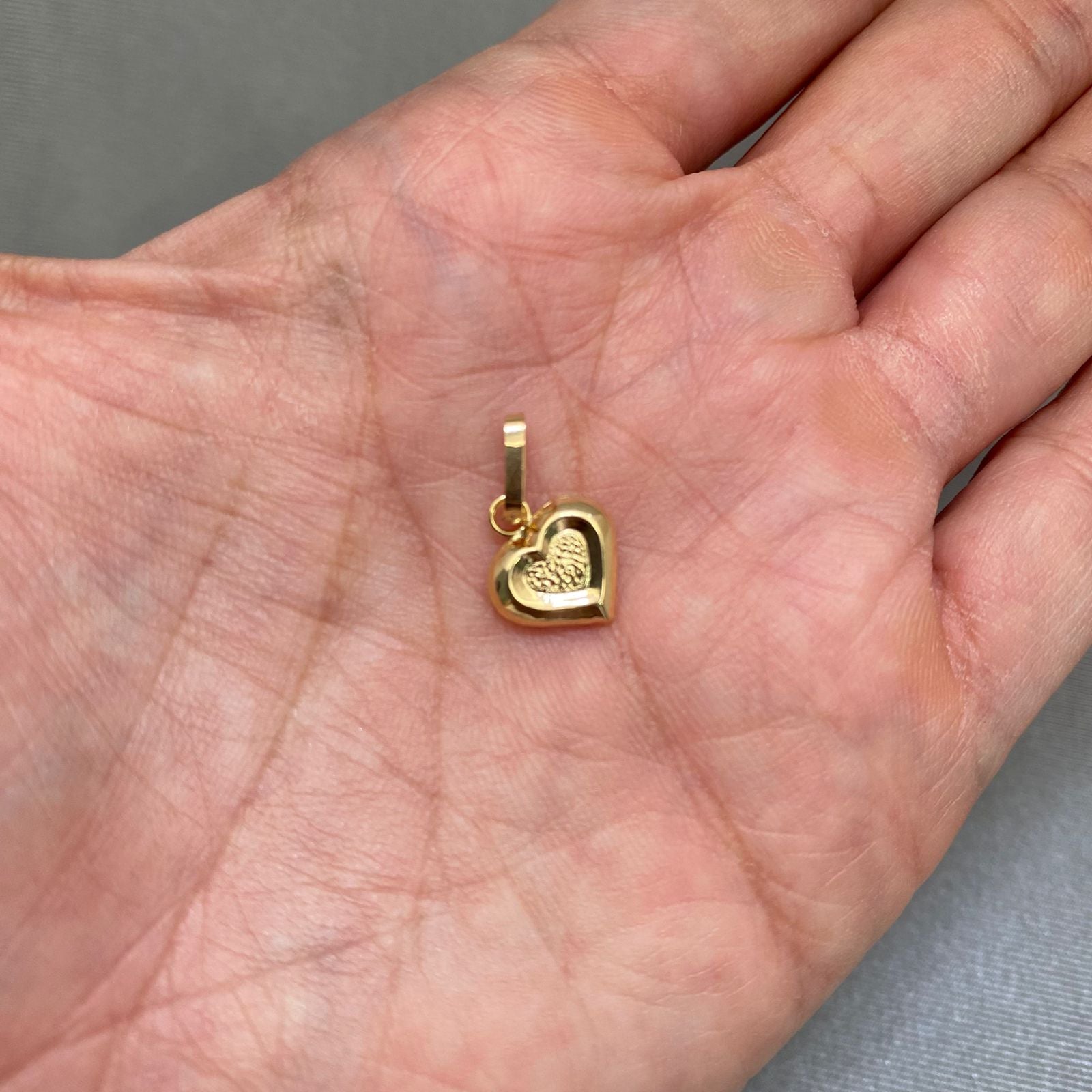 Dije corazon centro diamantado Oro amarillo 18k 0,5 Gr / 1,8 Cm
