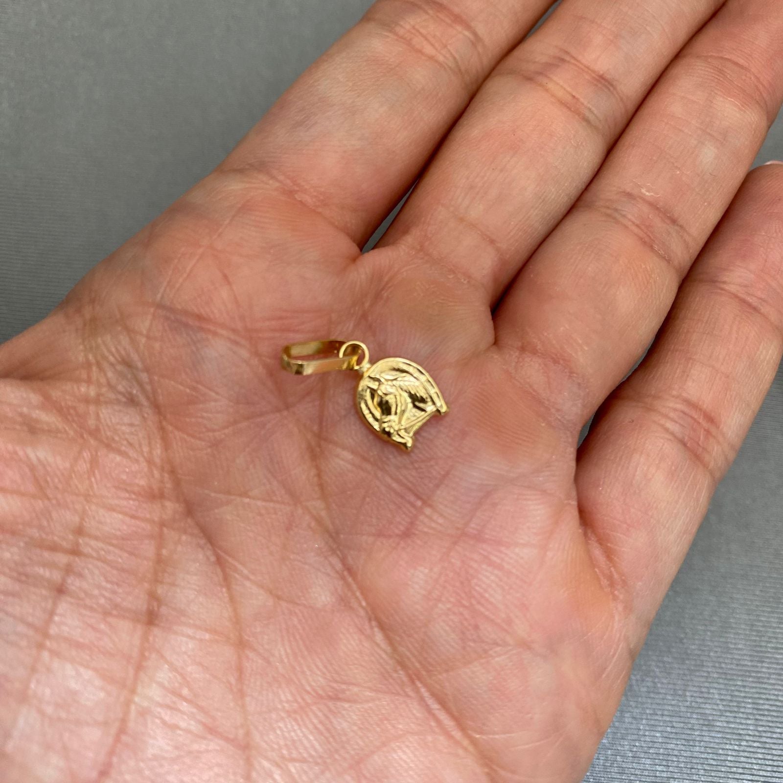 Dije herradura caballo Oro amarillo 18k 0,45 Gr / 1,8 Cm