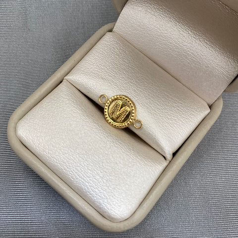 Herraje letra m Oro amarillo 18k 0,65 Gr