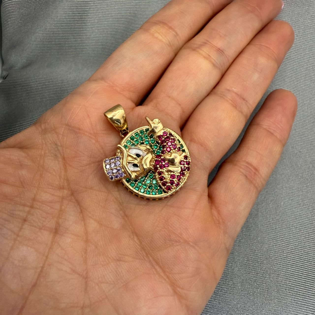 Dije redondo tio rico relieve casting Oro amarillo 18k 8,45 Gr / 3,0 Cm