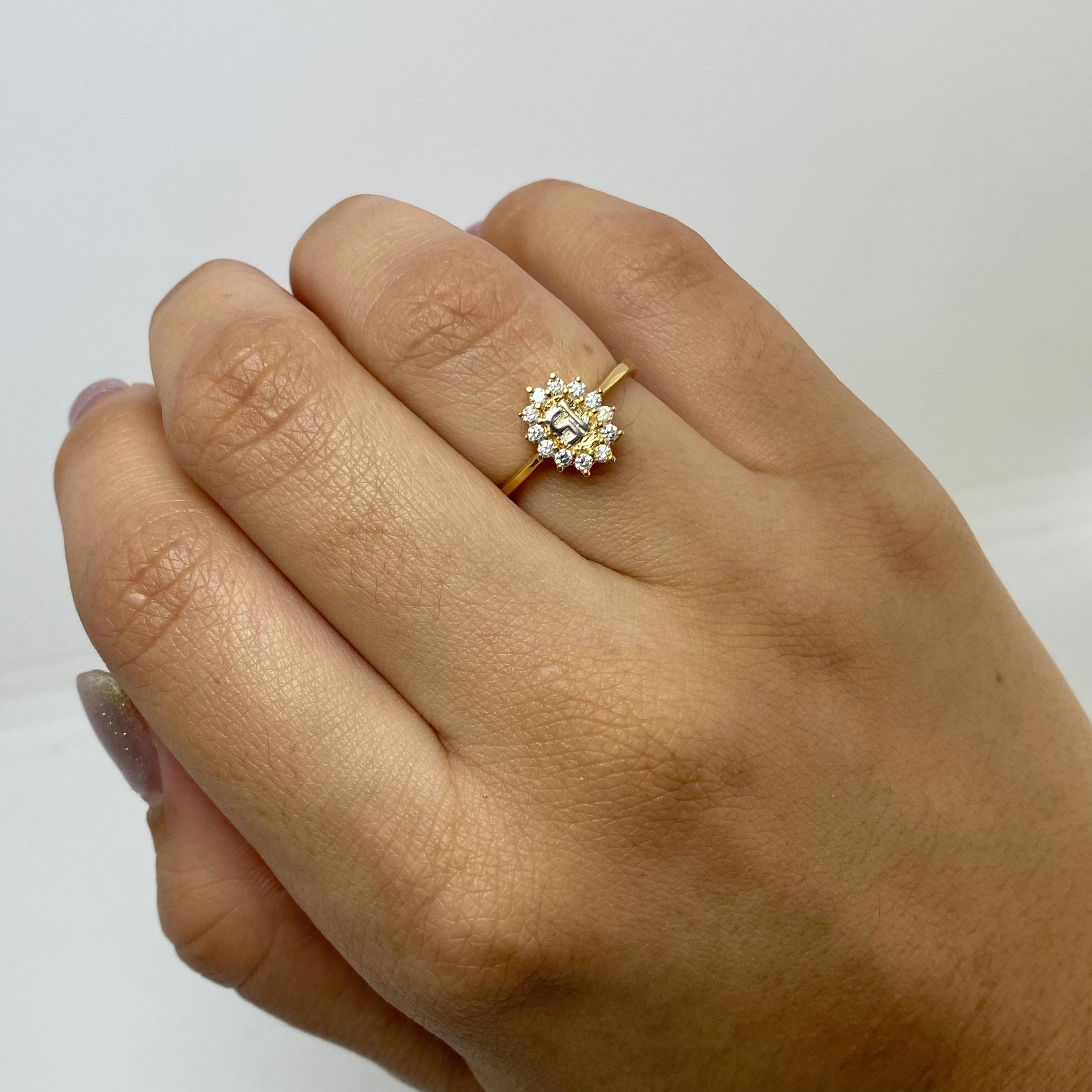 Anillo flor 15´s casting Oro amarillo 18k / Talla 6 1/4 / 2,0 Gr