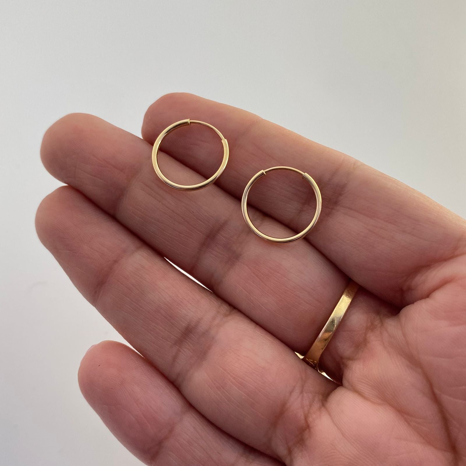 Candonga imperdible lisa Oro amarillo 18k 0,7 Gr / 1,5 Cm