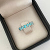 Anillo circones azules borde diamantes (POR FABRICACION) Oro blanco 18k / Talla 6 / 3,7 Gr