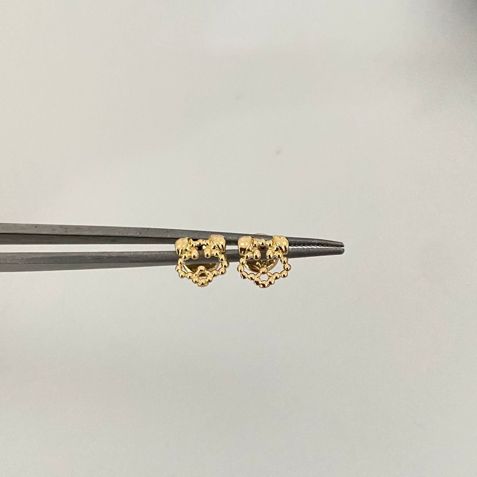 Topos silueta perro borde punetado Oro amarillo 18k 0,85 Gr / 6,8 mm