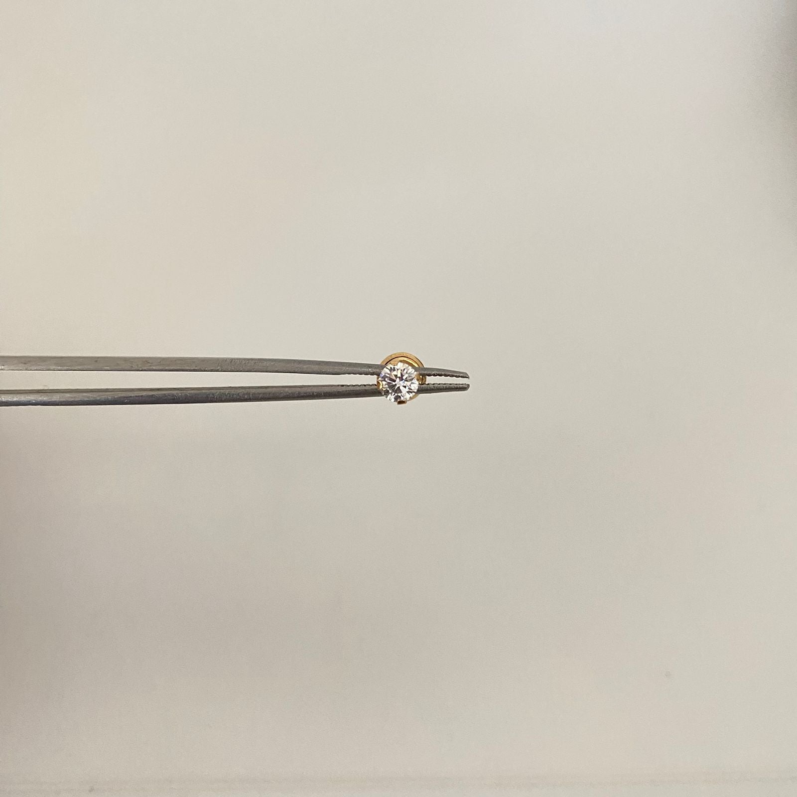 Topo circon blanco Oro amarillo 18k 0,35 Gr