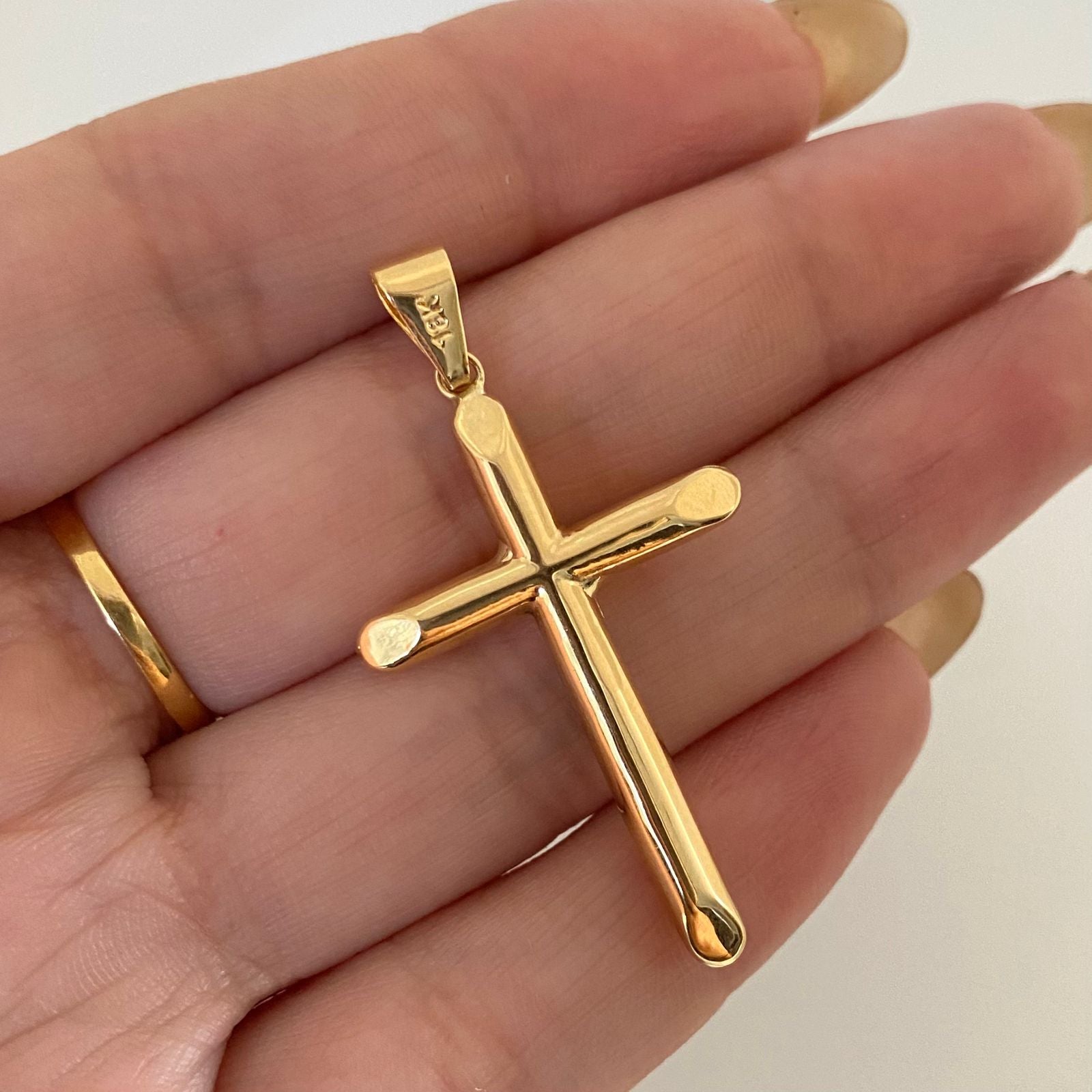 Dije cruz troquelada lisa Oro amarillo 18k 1,6 Gr / 5,0 Cm