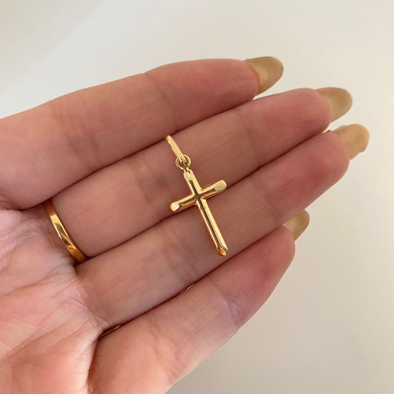 Dije cruz troquelada lisa Oro amarillo 18k 0,85 Gr / 3,0 Cm