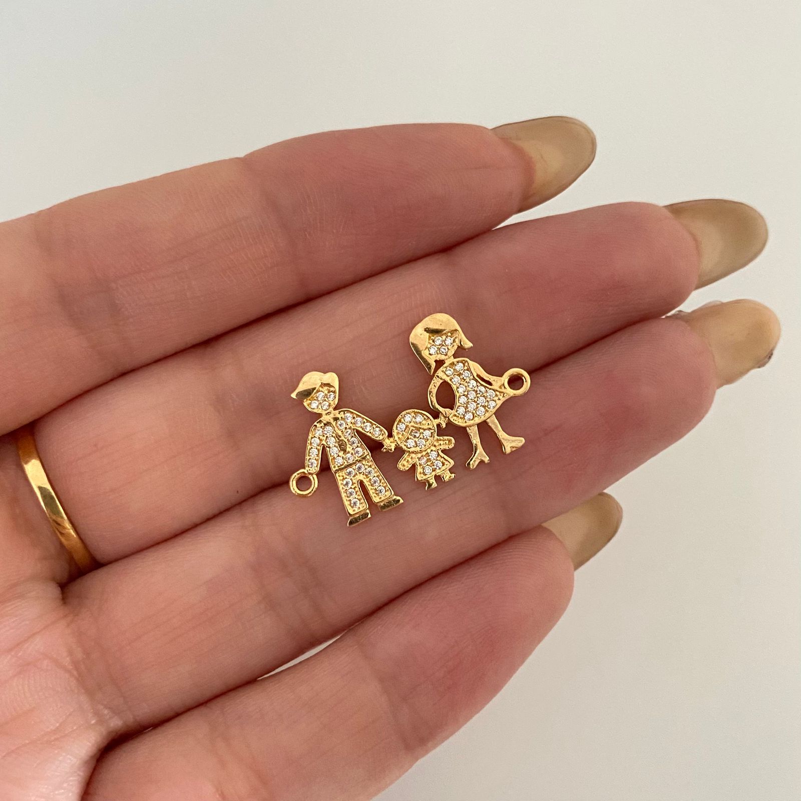 Dije familia casting Oro amarillo 18k 1,85 Gr / 2,5 Cm