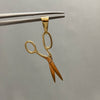 Dije tijera lisa (POR FABRICACION) Oro amarillo 18k 3,05 Gr / 3,0 Cm