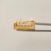 Anillo nombre Nicole (POR FABRICACIÓN) Oro amarillo 18k / Talla 7 1/2 / 5,55 Gr