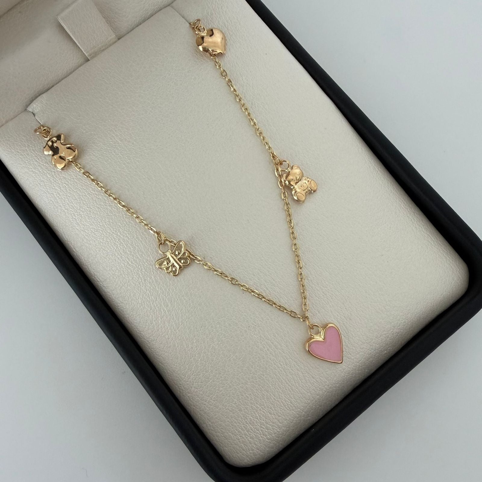 Pulso aro seguido colgantes figuras Oro amarillo 18k 2,60 Gr / 19 Cm  Broche 0,40