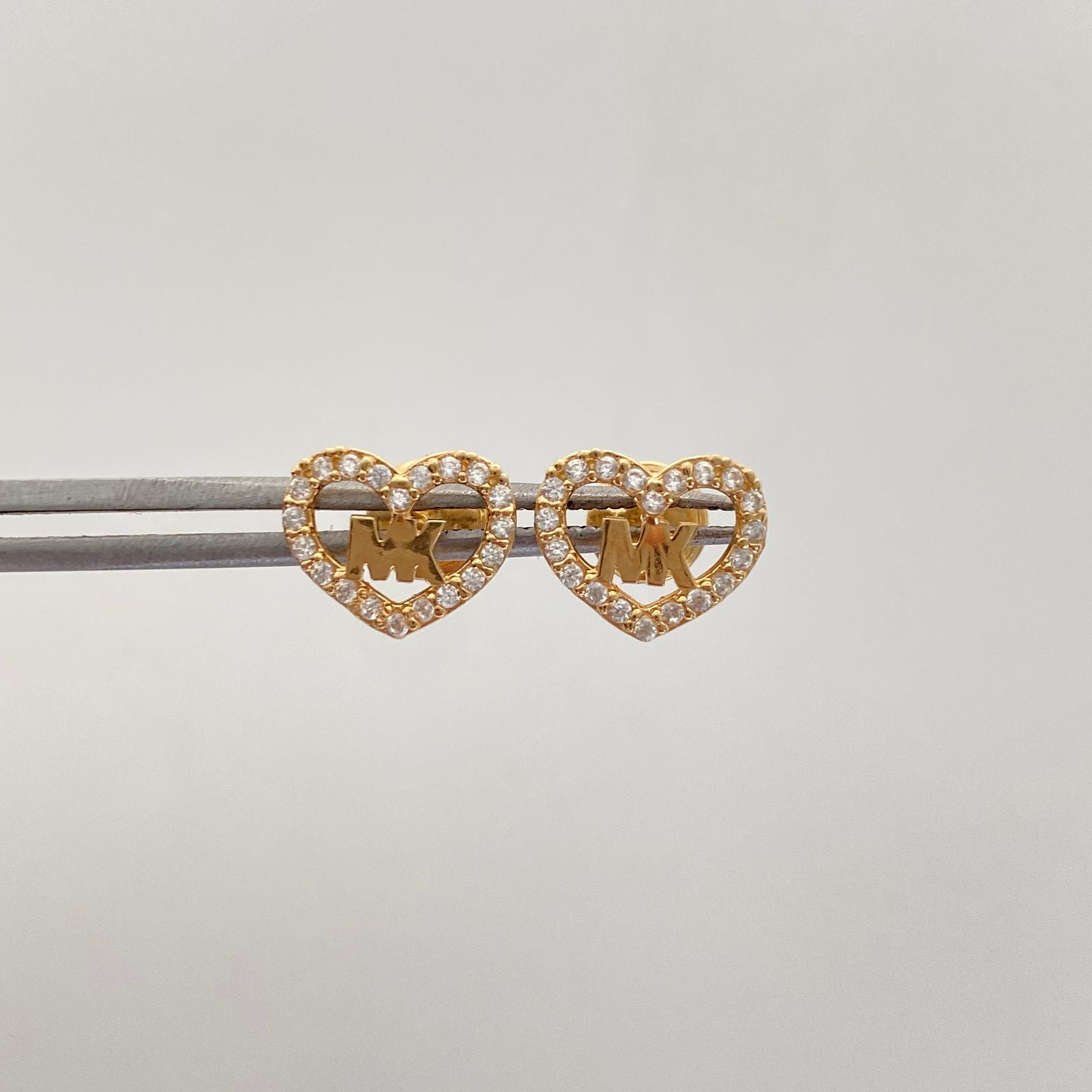 Topos corazon mk con circones blancos  Oro amarillo 18k 1,1 Gr / 9,6 mm