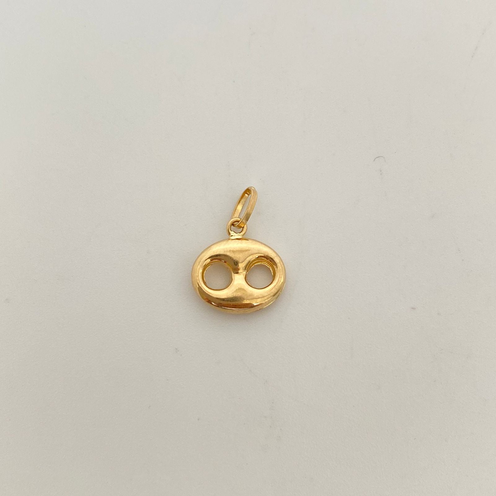 Dije gc  Oro amarillo 18k 0,55 Gr / 11,3 mm / 1,5 Cm