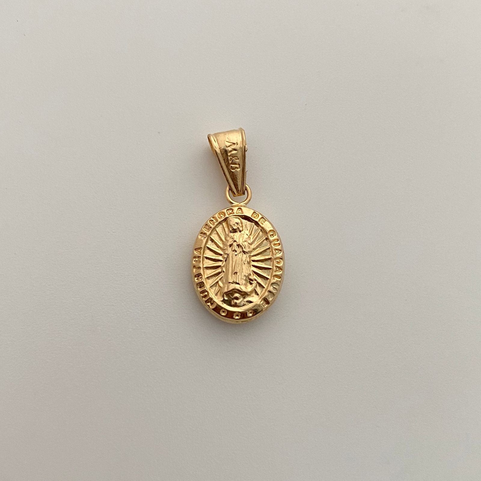 Dije Virgen De guadalupe Oro amarillo 18k 0,95 Gr / 10,4 mm / 2 Cm