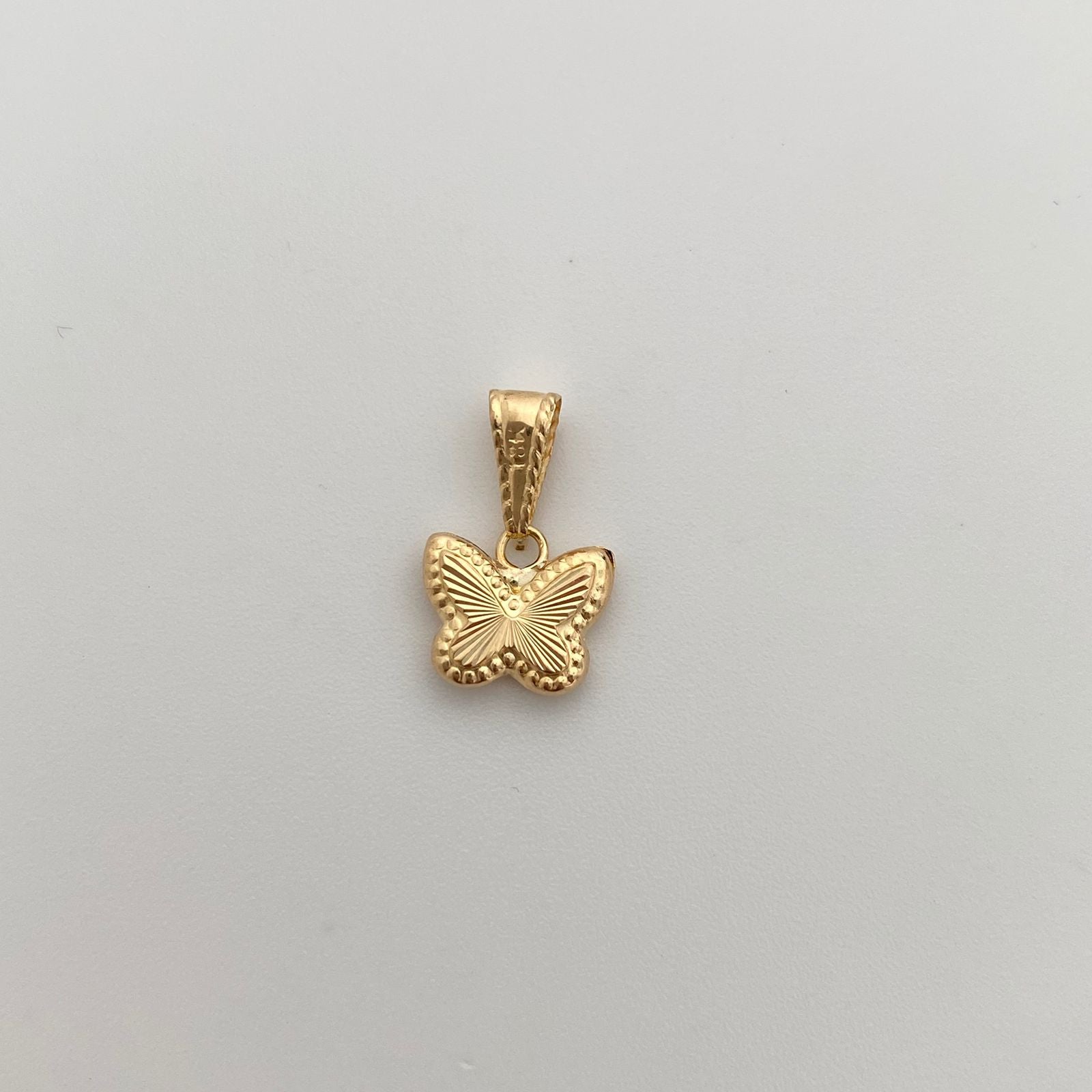 Dije Mariposa Diamantada Oro amarillo 18k 0,45 Gr / 9,9 mm / 1,5 Cm