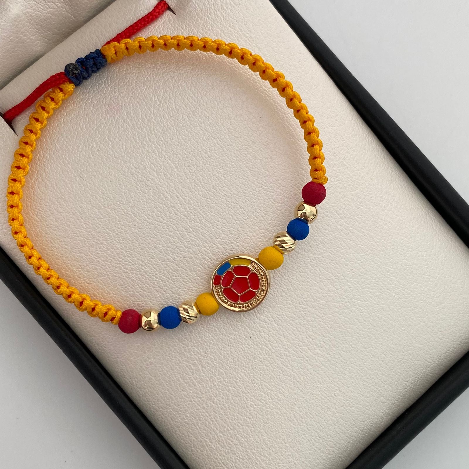 Pulsera tejida Seleccion Colombia balines lisos y diamantados 4mm Oro amarillo 18k 0,95 Gr