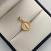 Dije Virgen de Guadalupe redonda Oro amarillo 18k 0,85 Gr / 12,3 mm / 2 Cm