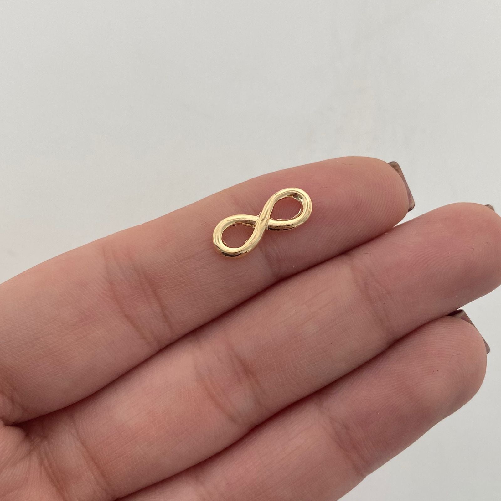 Herraje Infinito mediano Oro amarillo 18k 0,45 Gr / 0,5 Cm