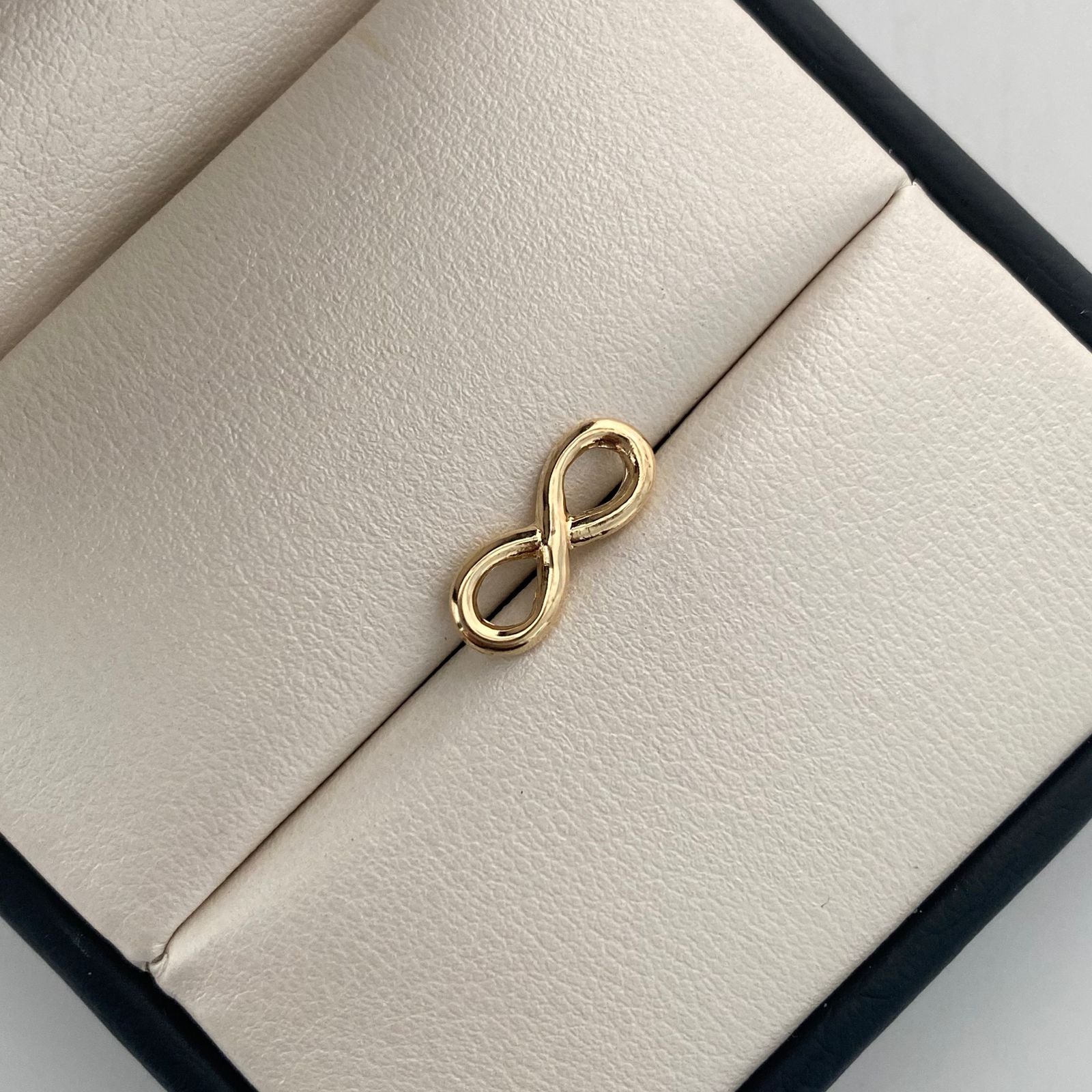 Herraje Infinito mediano Oro amarillo 18k 0,45 Gr / 0,5 Cm