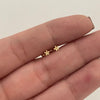 Topos Mini Florecita Oro amarillo 18k 0,4 Gr / 3,3 mm