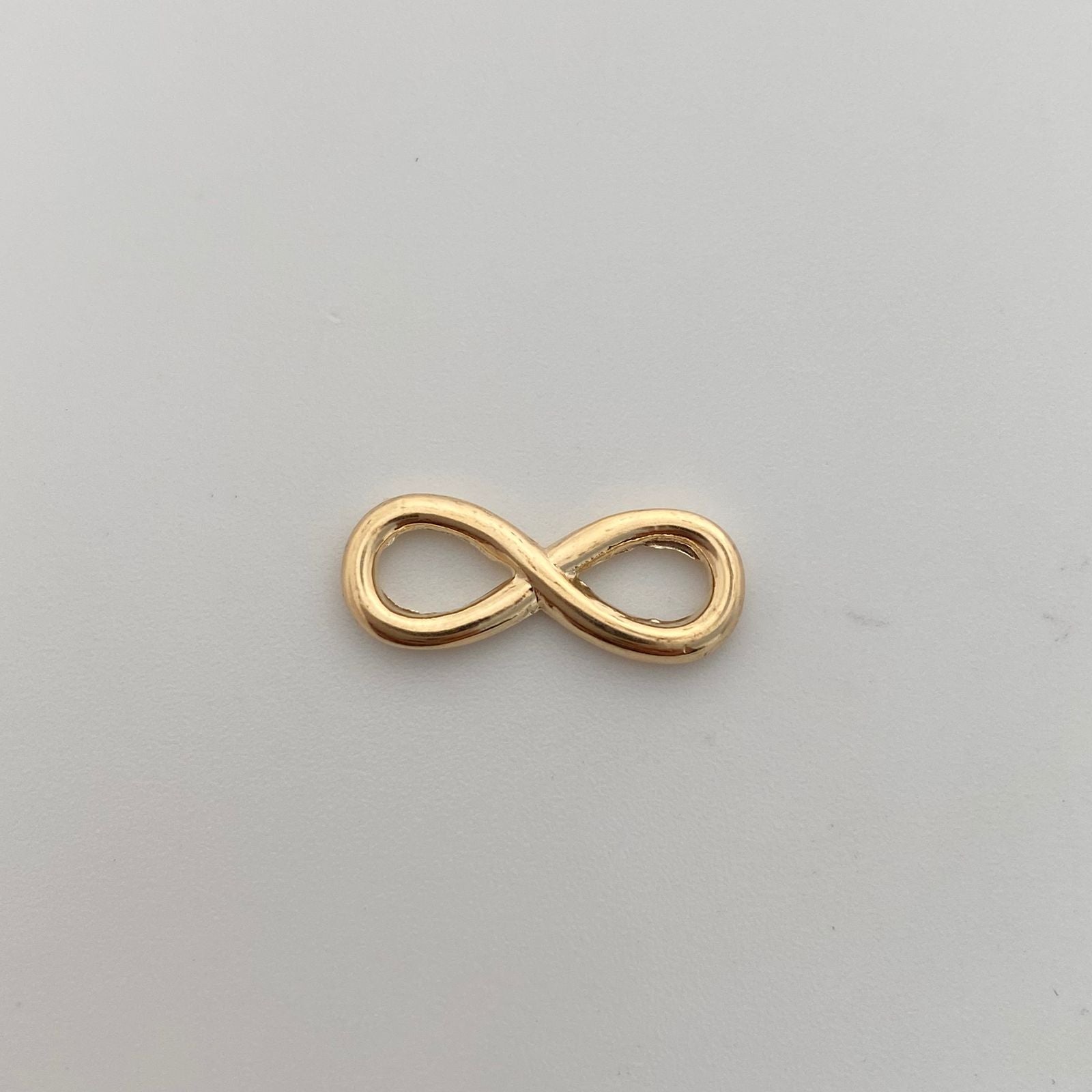 Herraje Infinito Grande Oro amarillo 18k 0,75 Gr / 0,8 Cm