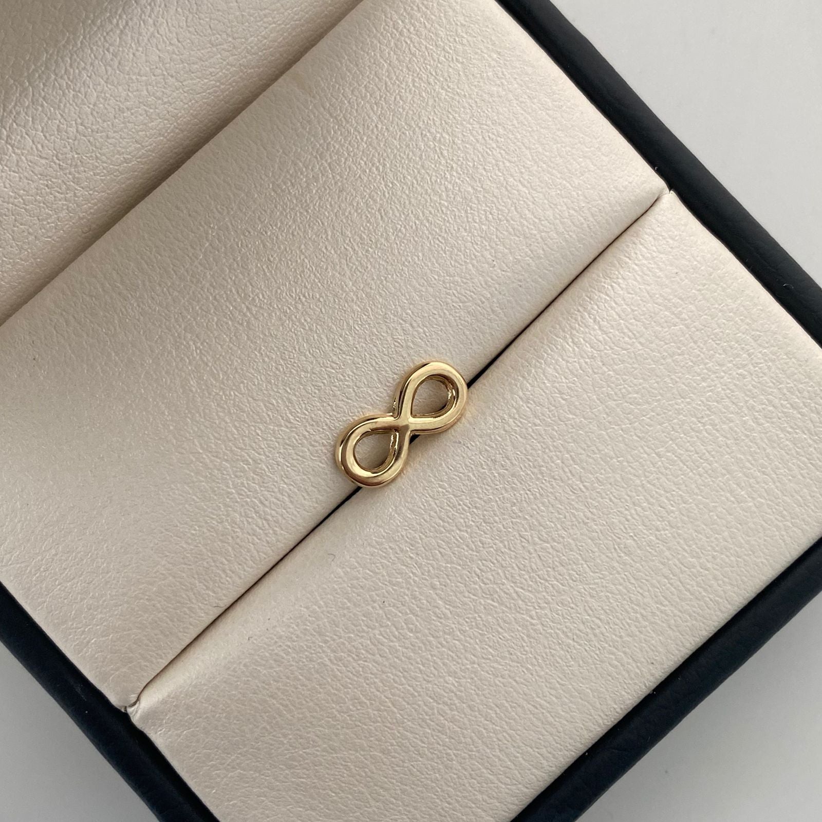 Herraje Infinito pequeño Oro amarillo 18k 0,35 Gr / 0,5 Cm