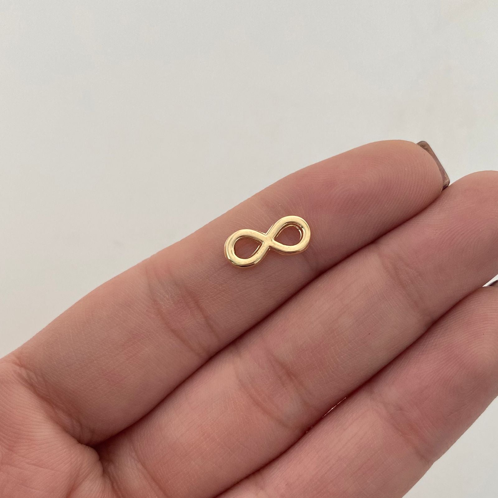 Herraje Infinito pequeño Oro amarillo 18k 0,35 Gr / 0,5 Cm