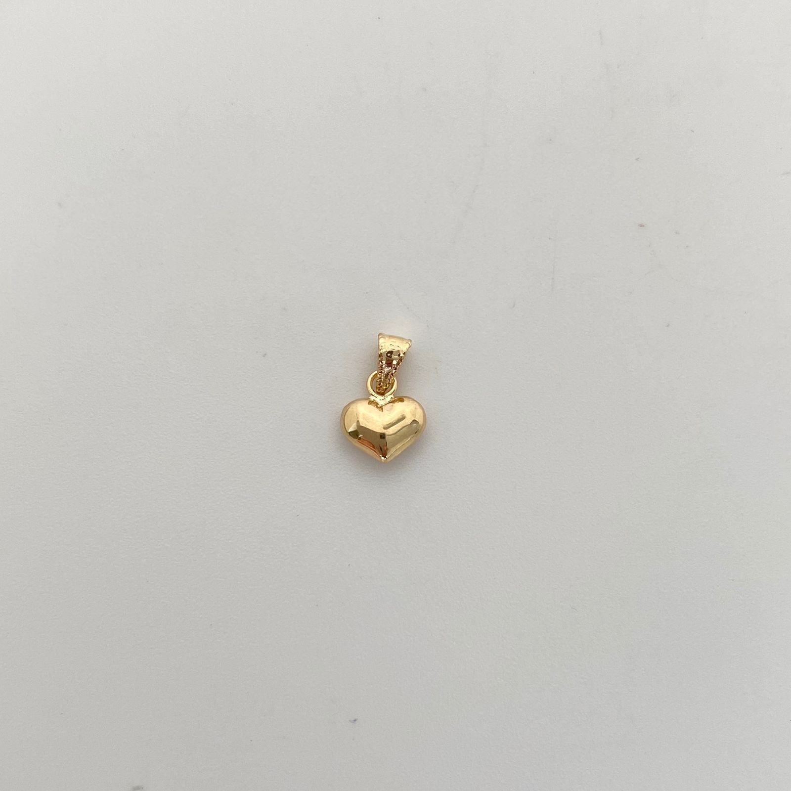 Dije Corazon Inflado Oro amarillo 18k 0,3 Gr / 7,3 mm / 1,2 Cm