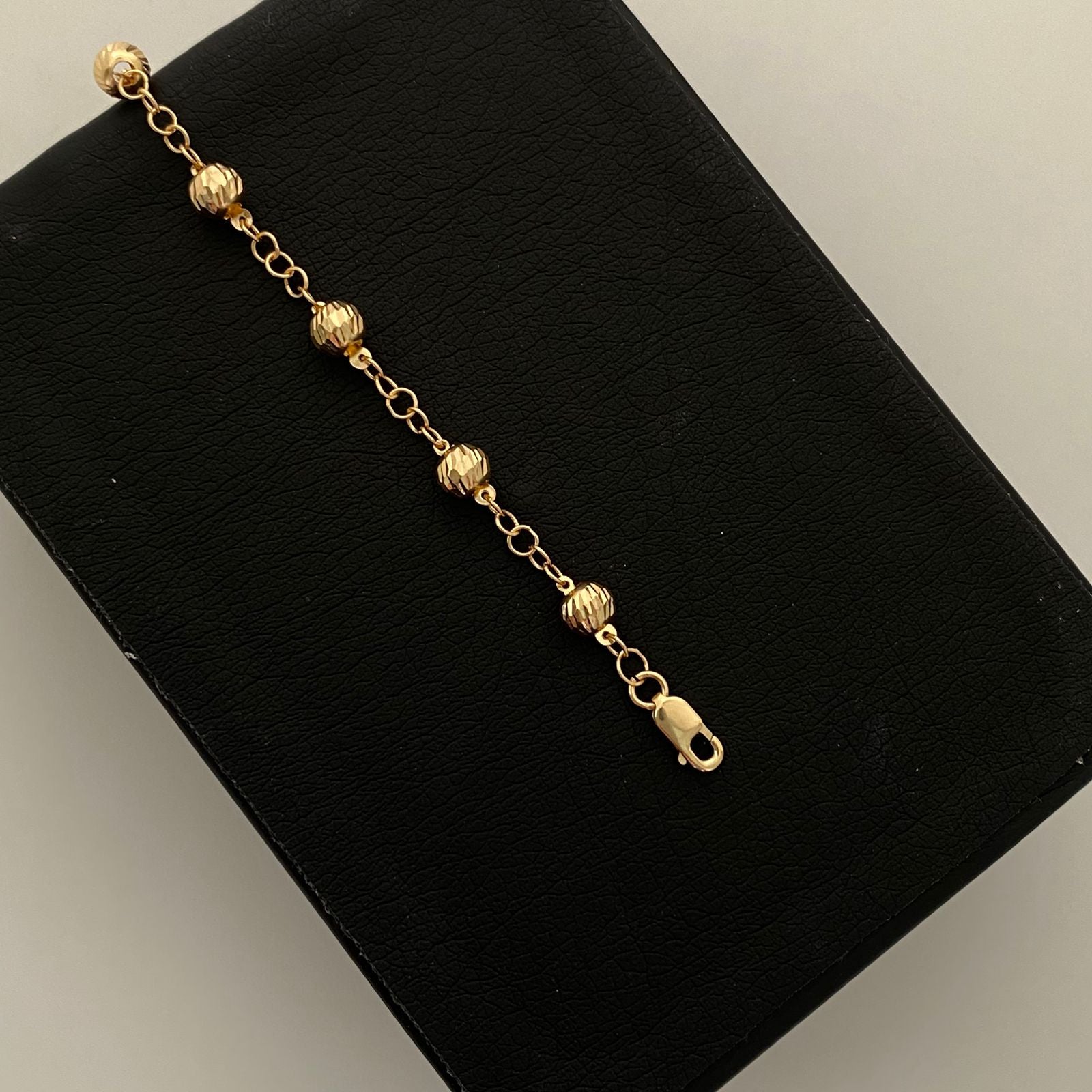 Pulso Denario bola diamantada 5mm Oro amarillo 18k 3,20 Gr / 18,1 Cm  Broche 0,40